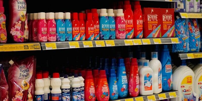Shelves stocked with various cleaning supplies and detergents